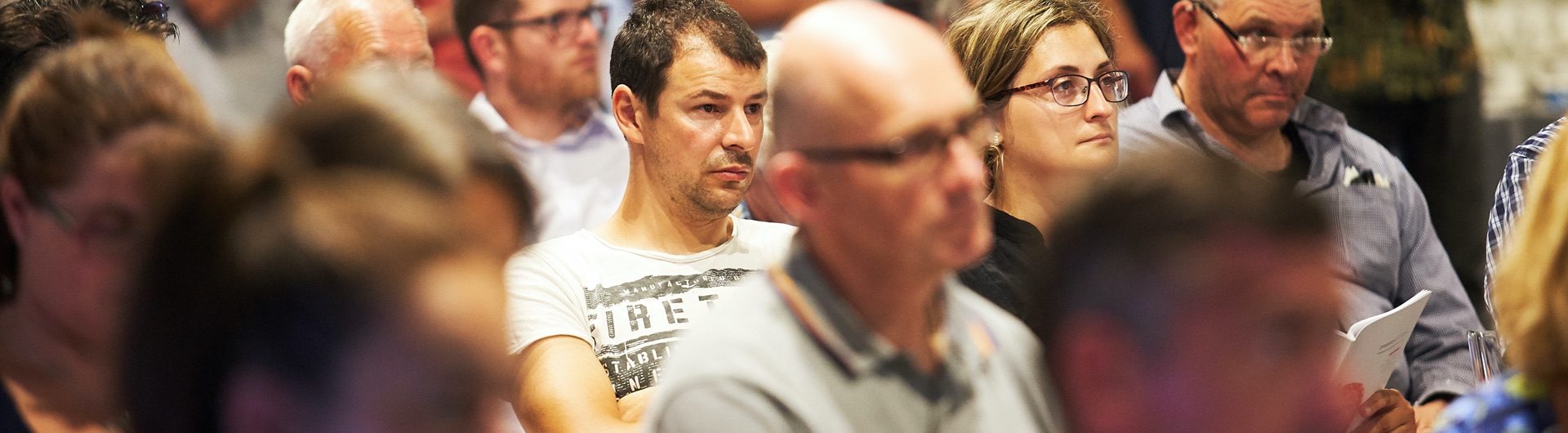 Man watching an auction